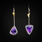 Trapeche amethyst earrings set in sterling silver accented with 22k gold