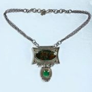 sterling silver and gold necklace with parrot wing chrysocolla and emerald stones