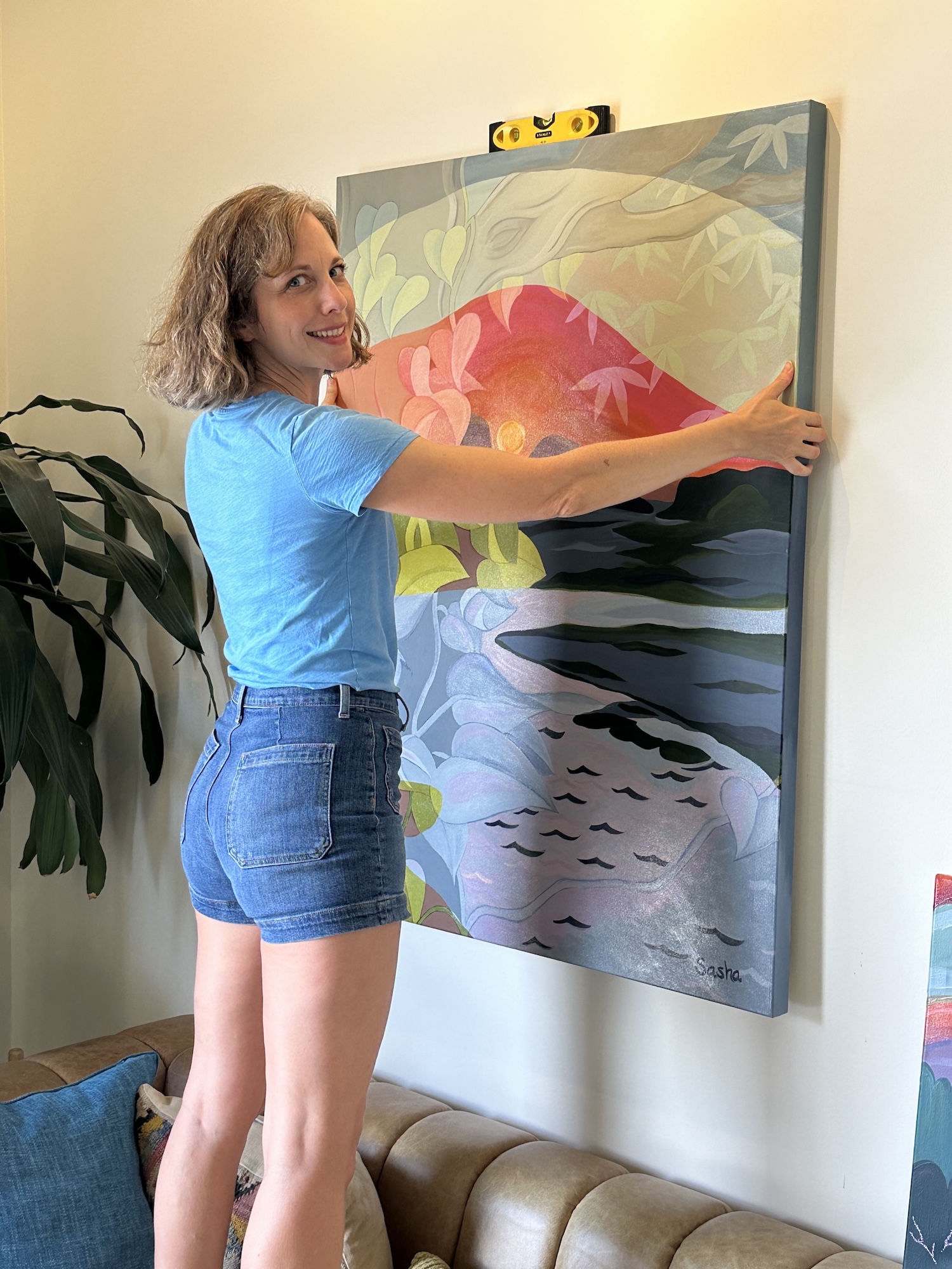 Hanging a painting